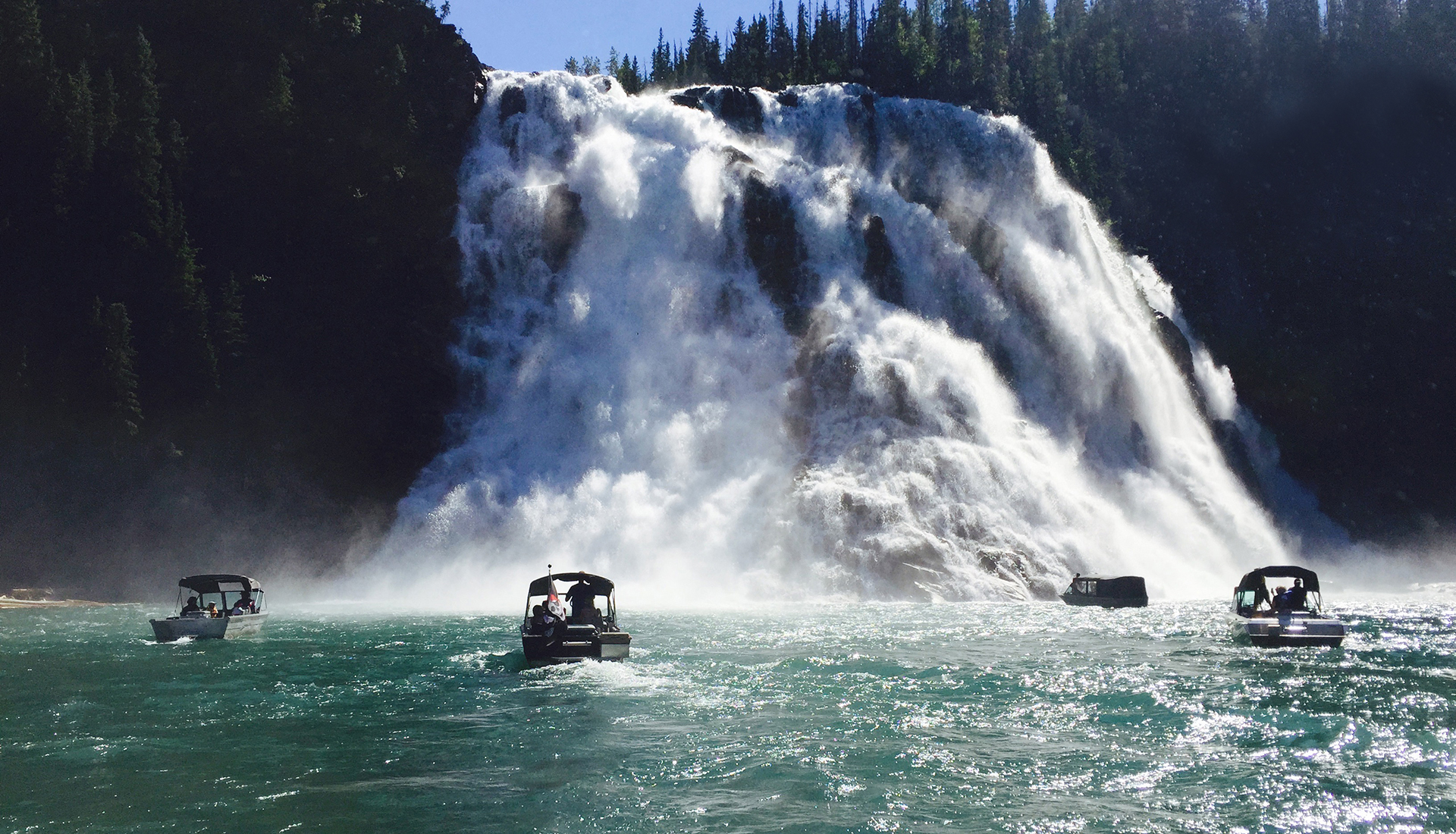 boats near Kinuseo Falls, Alberta