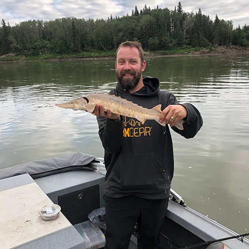 Neil Pederson holding a fish